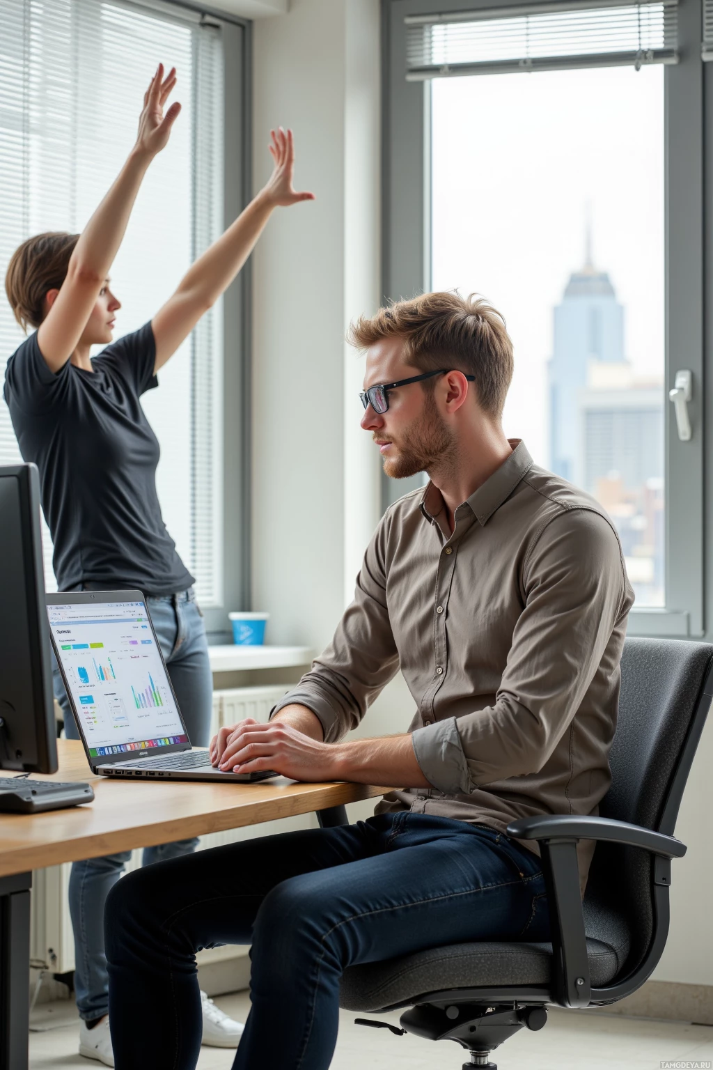 Realistic high quality photo. A 34‑year‑old man with short blonde hair, blue eyes, pale skin, wearing a neutral button‑down shirt, dark jeans, and sleek glasses, sits at a modern office desk in the morning, reviewing a data dashboard on a laptop while blinds filter light onto the monitor, a city view visible through the window, and he stands near the window stretching his arms.